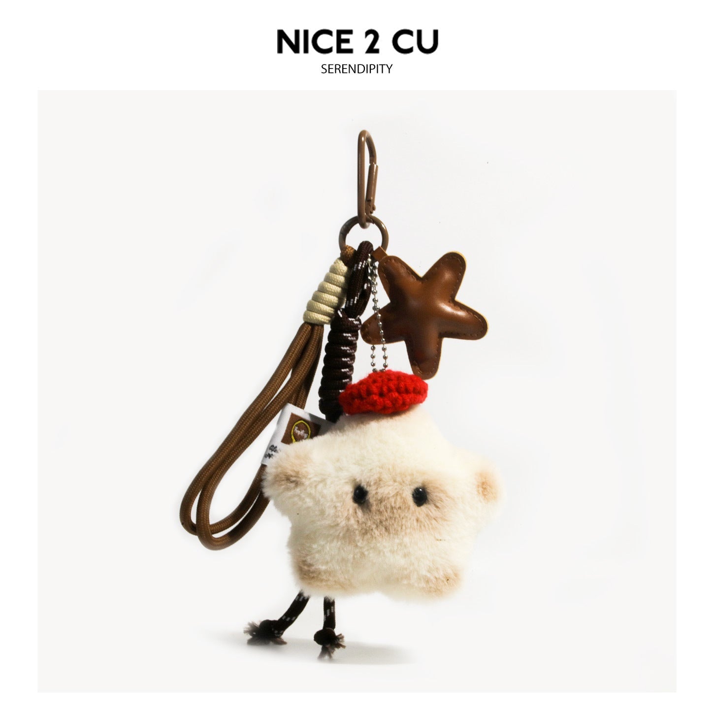 Cream plush cat figure keychain charm with red crocheted beret, star pendant, braided strap, and carabiner clip