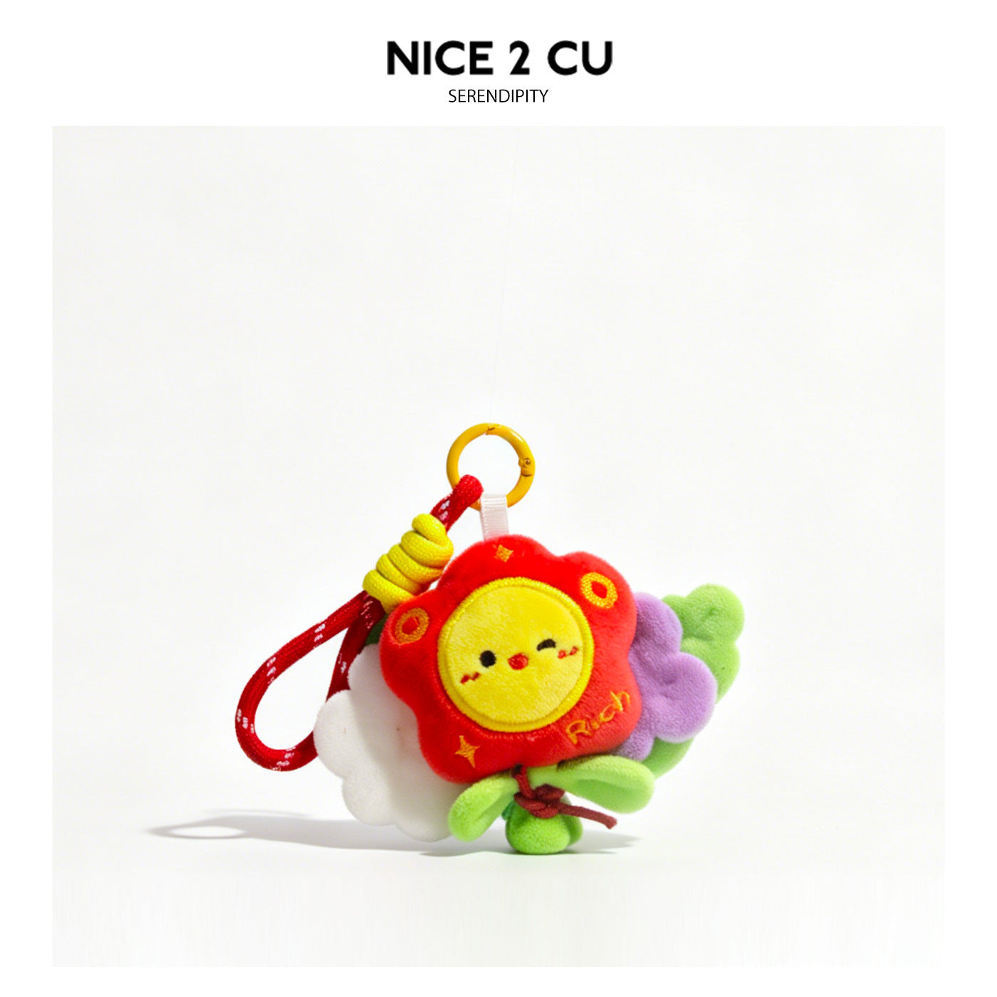 Little Red Flower kawaii plush keychain charm with smiling face, red scalloped petals, green leaves, and yellow metal ring