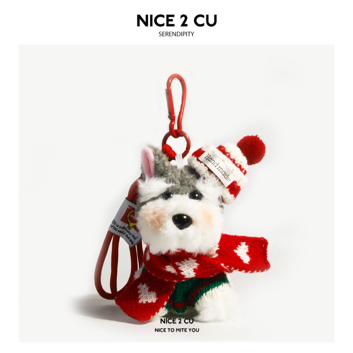 Schnauzer plush bag charm with red-and-white striped knit hat, red scarf, and red carabiner clip