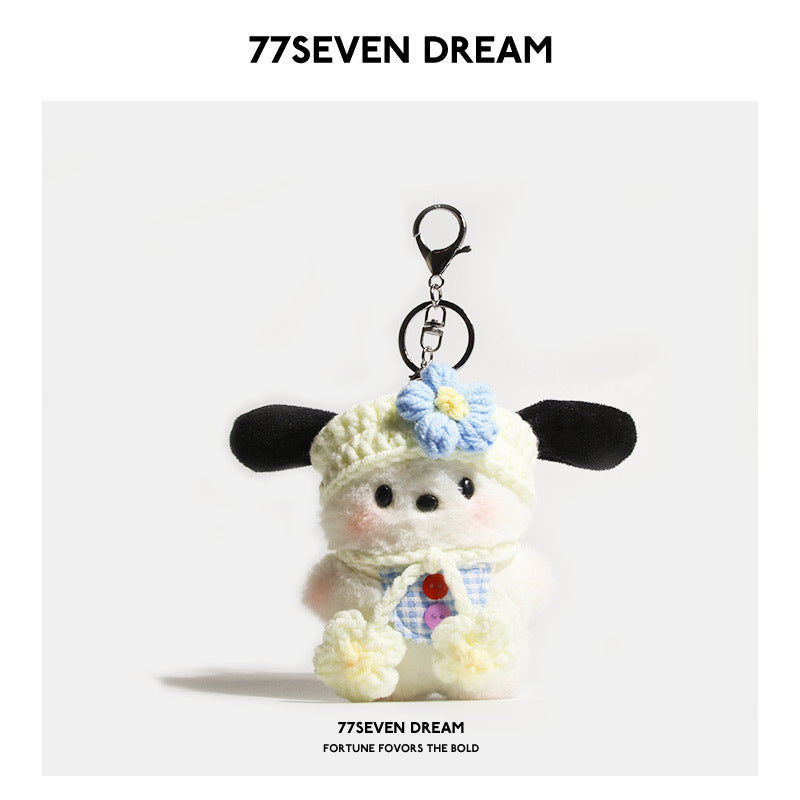 Kawaii dog plush keychain charm with blue gingham bib, cream knit hat with blue flower, and silver lobster clasp