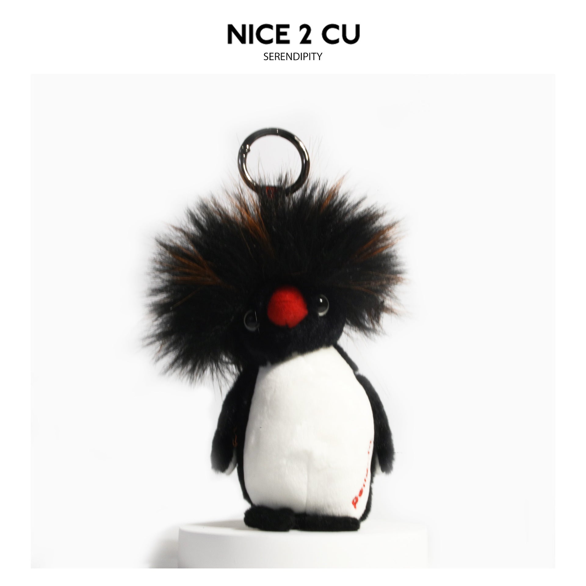 Wild-hair plush penguin keychain with spiky black-brown faux-fur hair, red beak, and silver metal split ring