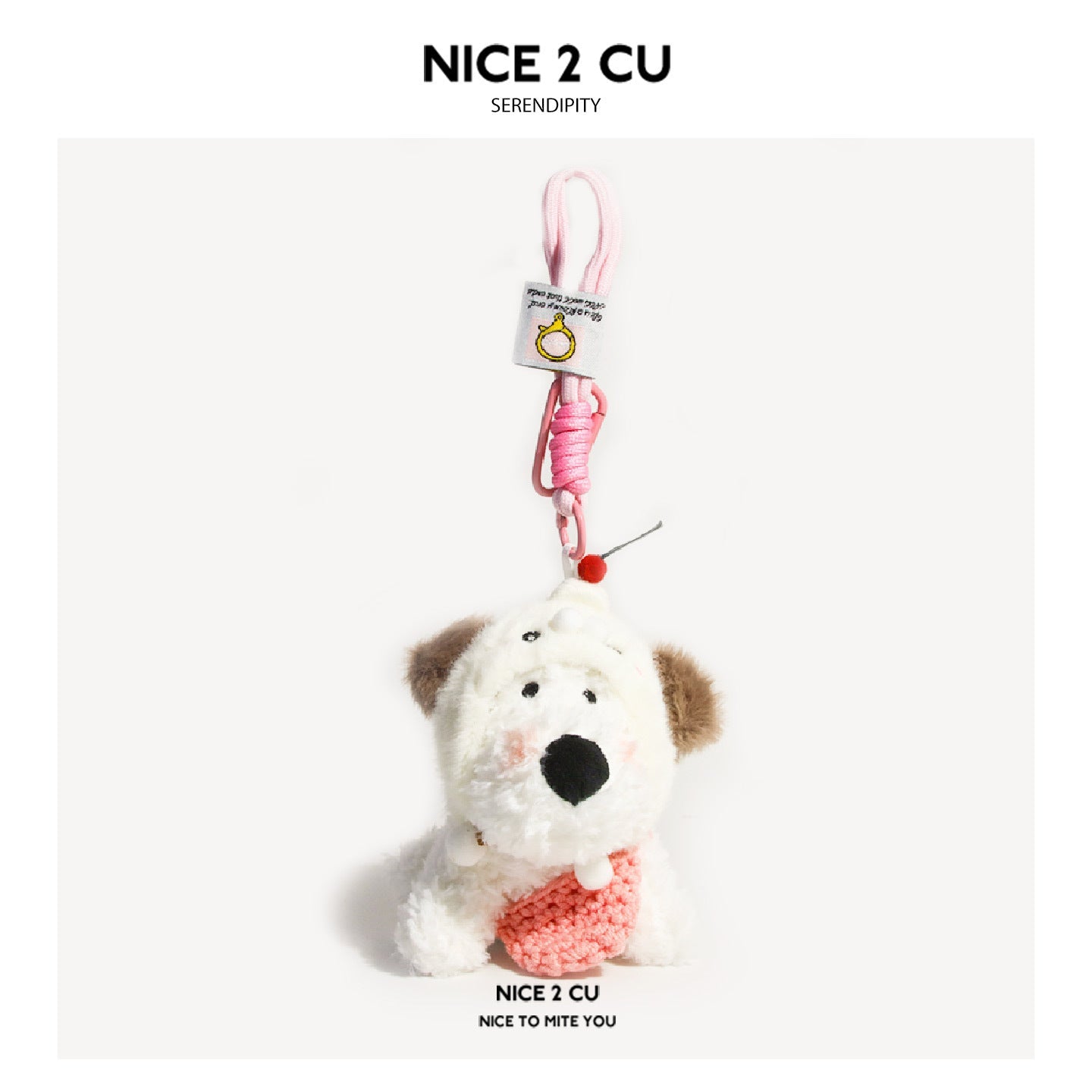 White fluffy Westie dog plush keychain charm wearing a dog hood and pink knit sweater with carabiner clip
