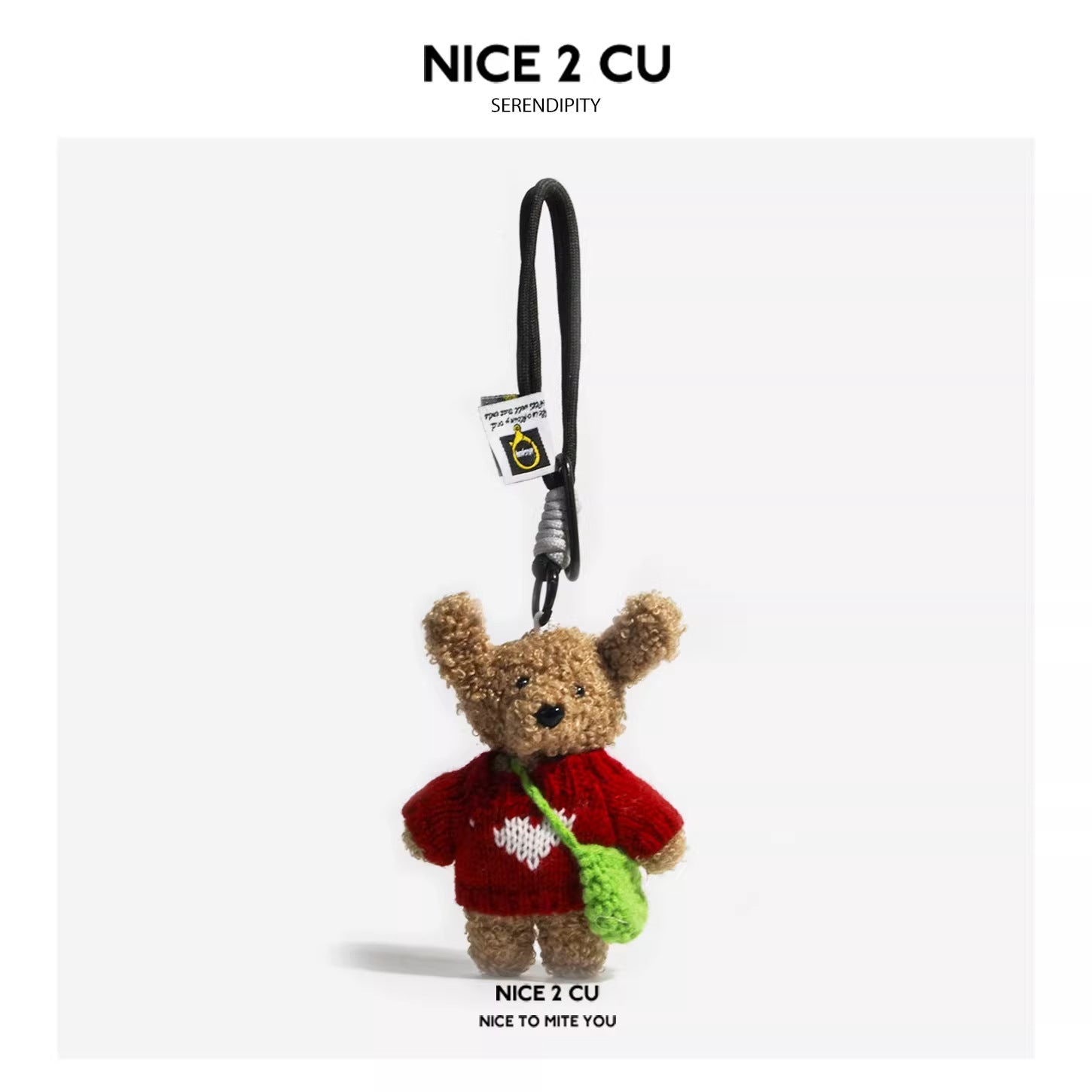 Plush teddy bear charm wearing a red knitted sweater with white heart and bright green mini crocheted bag