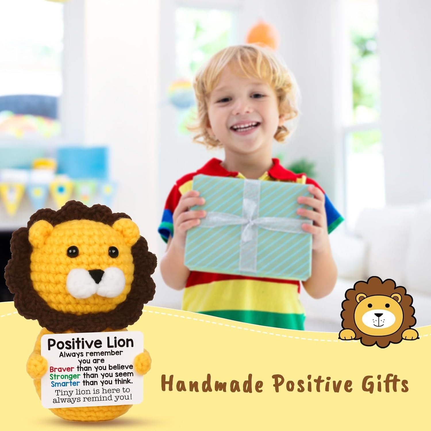 A smiling child holds a wrapped gift. In the foreground, ZoDoll’s Positive Lion Crochet Amigurumi—an inspirational plush toy—adds charm and warmth. Text reads: Handmade Positive Gifts.