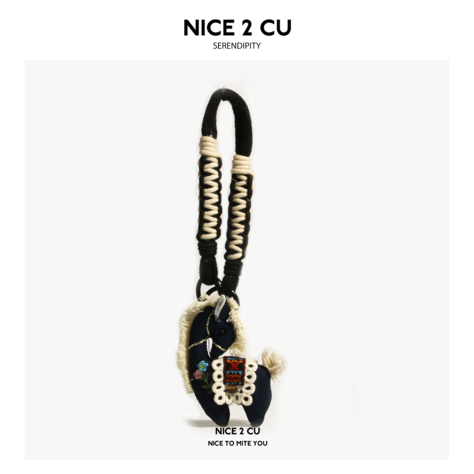 Navy blue fabric horse charm pendant with light fringe mane and woven cord strap