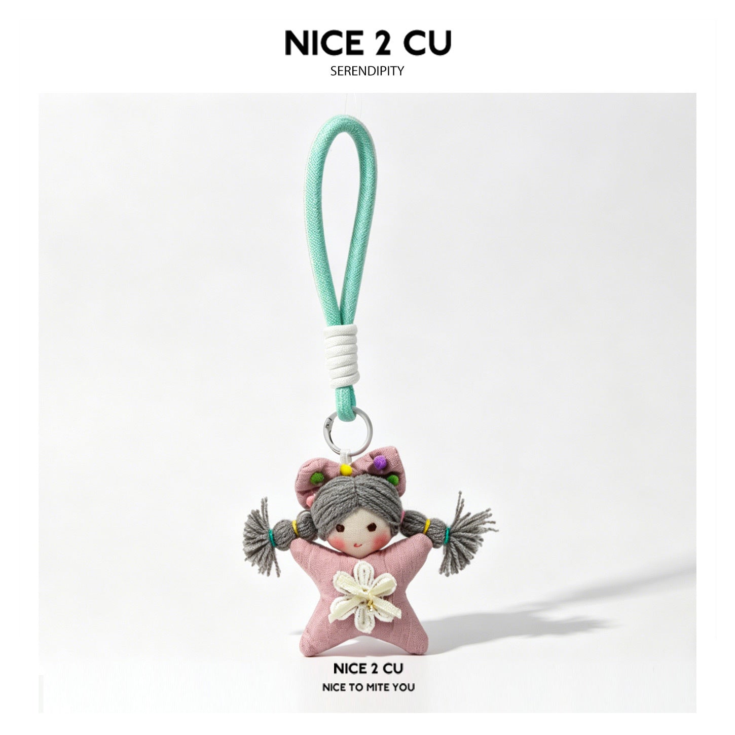 Pink star-shaped kawaii plush girl charm with gray yarn pigtails, pink bow, and mint green hand strap loop