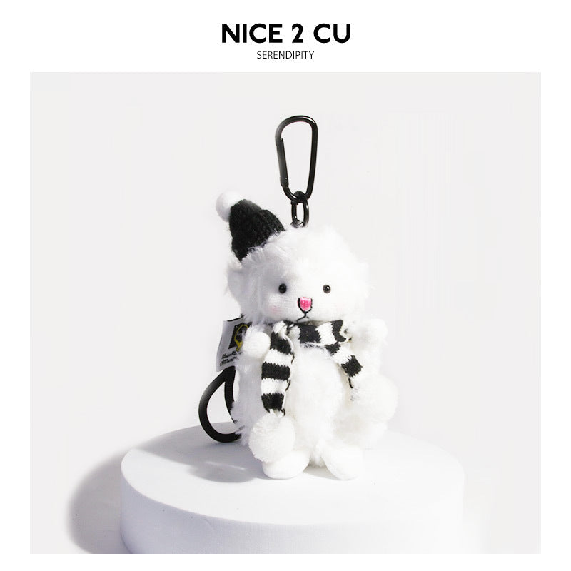 White fluffy lamb plush keychain with black-and-white striped knit hat and scarf, black carabiner clip