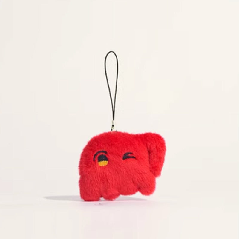 Red chibi plush keychain with winking embroidered face and black loop strap on light background