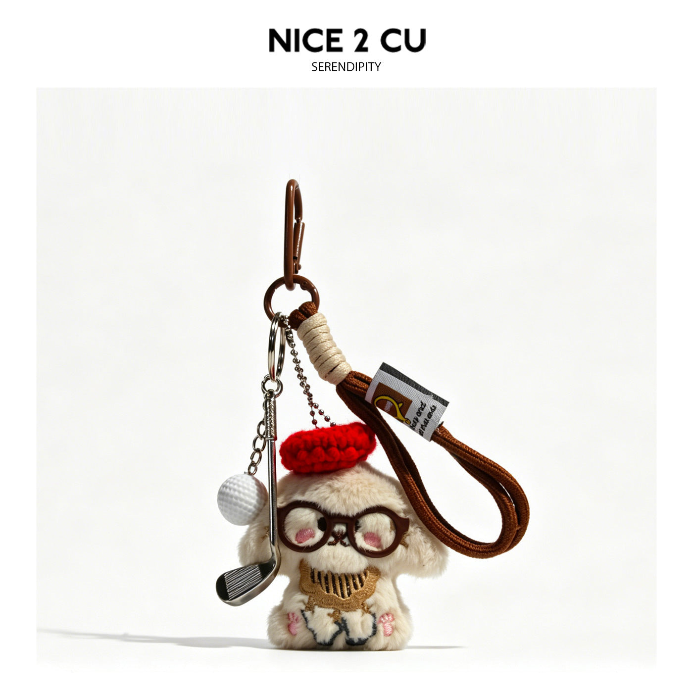Kawaii plush dog keychain with red hat and embroidered glasses alongside silver golf club and white golf ball charms