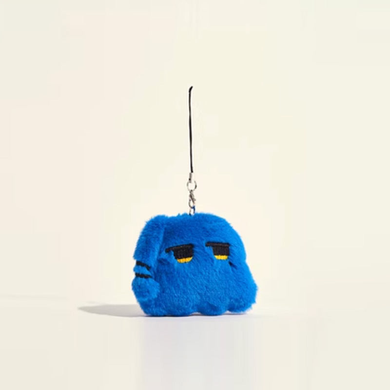 Blue chibi plush keychain with embroidered droopy eyes and black loop strap on light background