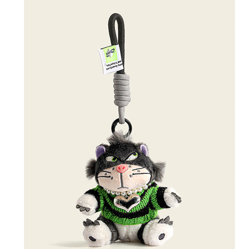 Black-face cat plush charm in green and black striped sweater with bead necklace and heart pendant