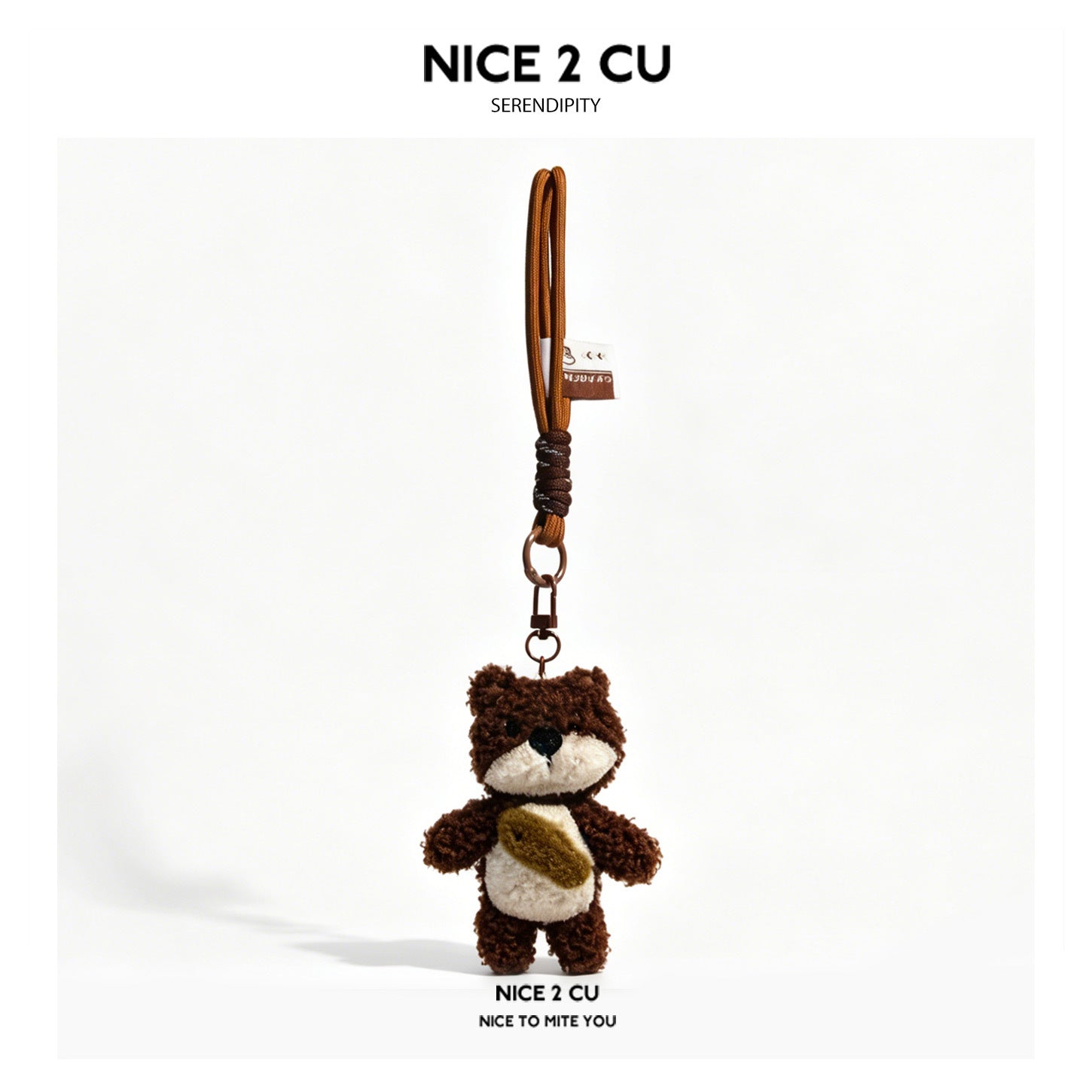 Brown curly-fur bear plush charm with cream snout and olive patch on a brown rope hand strap