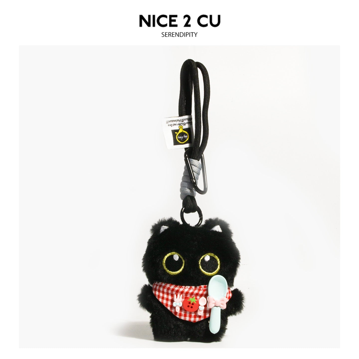 Black cat plush charm featuring red checkered bib and pale blue spoon accessory