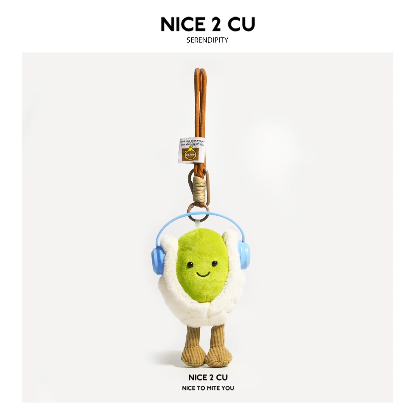 Kawaii pistachio plush charm with blue headphones clipped to braided cord