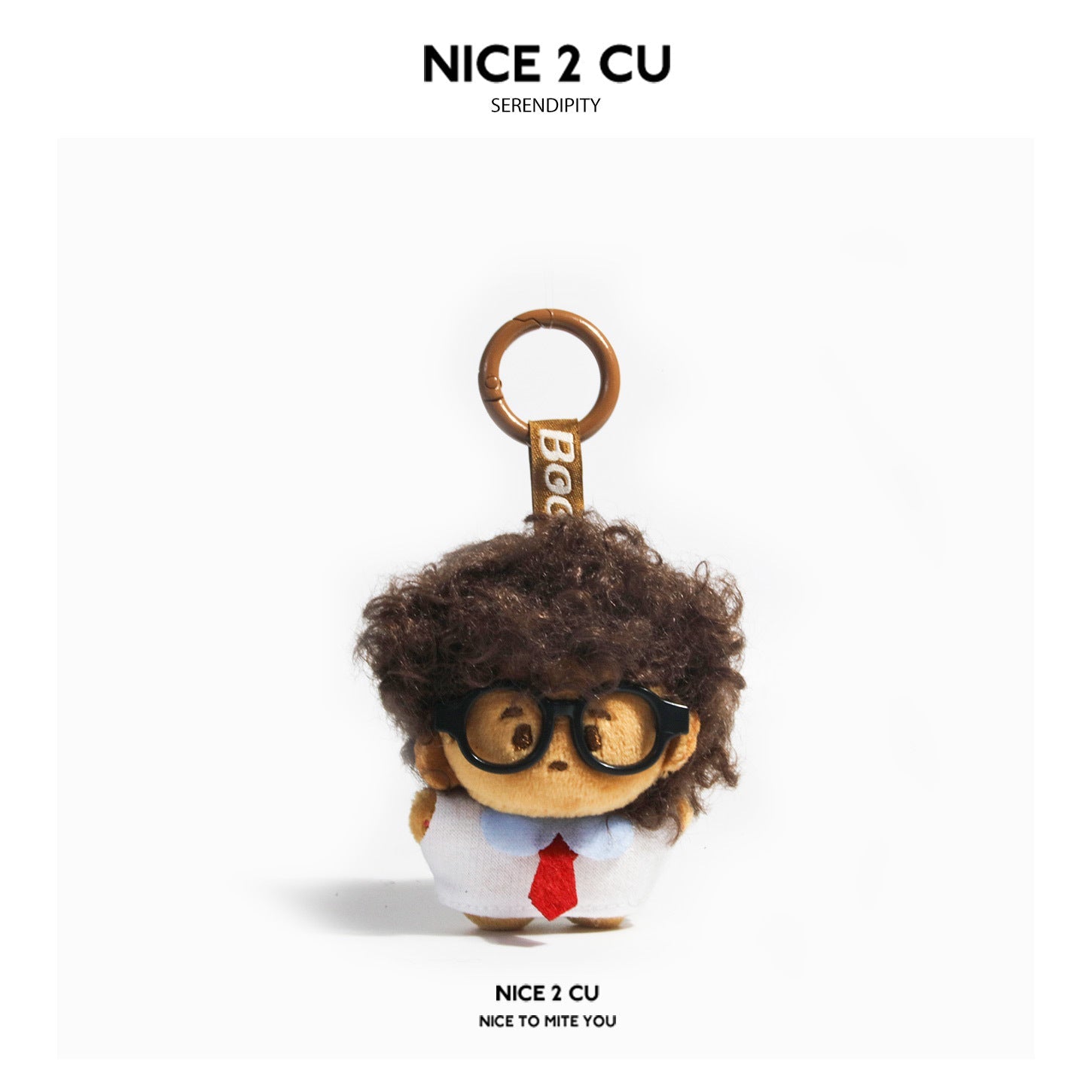 Dark brown curly-haired chibi plush doll keychain with black glasses and white outfit on brown carabiner ring