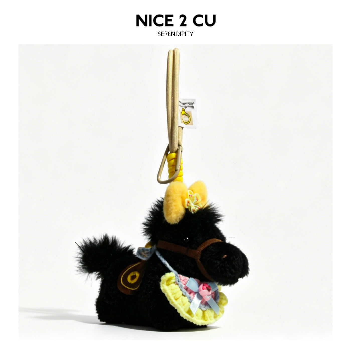 Black plush horse keychain with yellow bow trim, yellow ear accents, and decorative front saddle detail