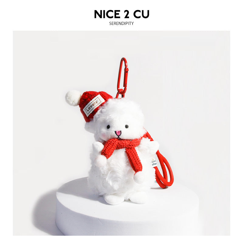 White fluffy lamb plush keychain wearing a red knit hat with pom-pom and red scarf, red carabiner clip
