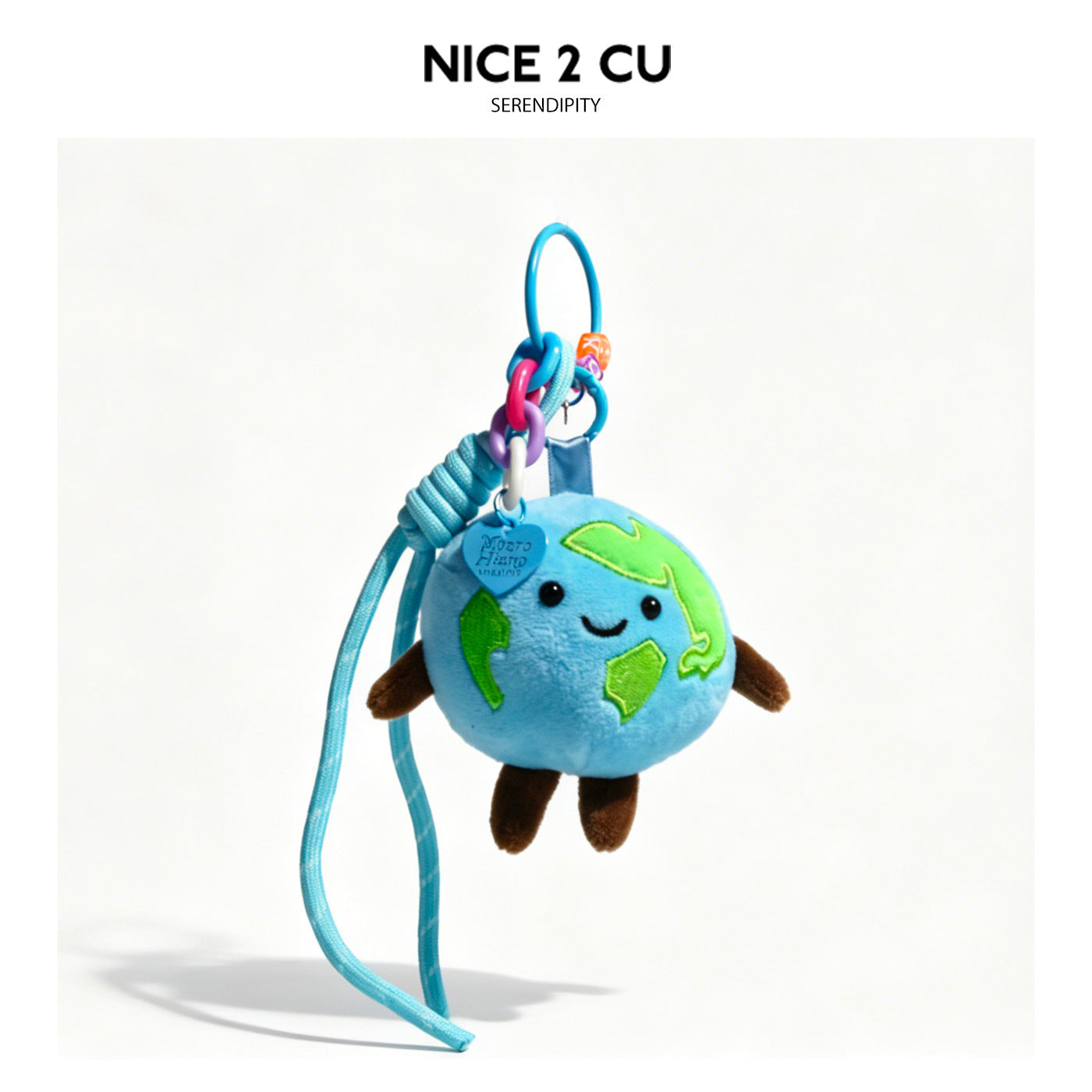 Light blue Earth globe plush ornament with blue heart charm, small bell accent, and colorful hanging rings