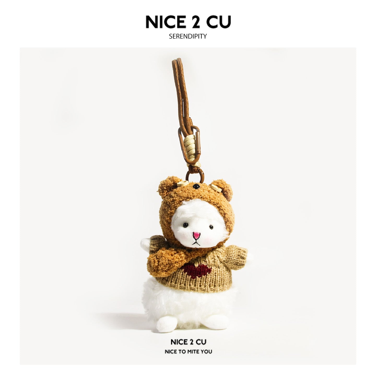 White lamb plush keychain wearing a brown teddy bear costume hood and beige knitted sweater with heart motif