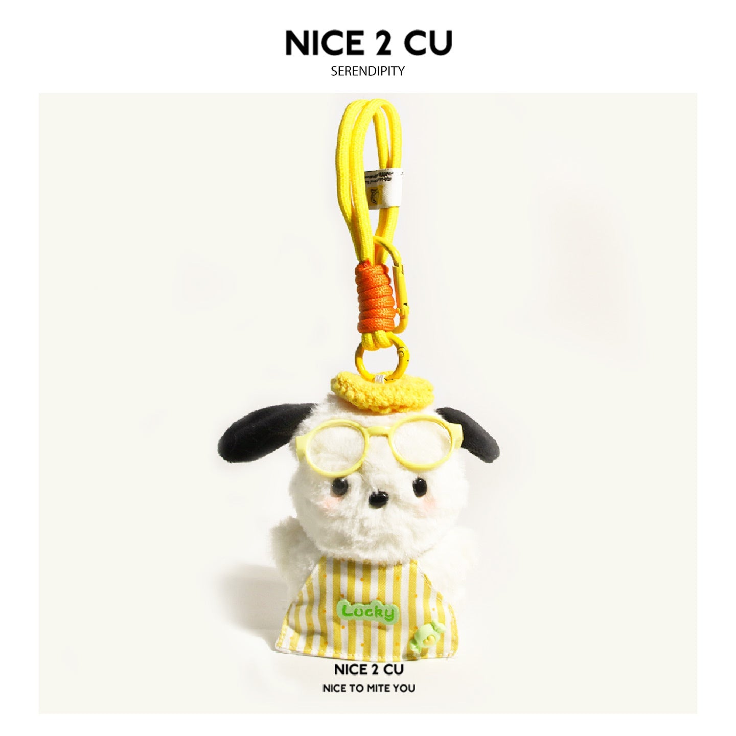 Kawaii plush dog charm in yellow striped apron with Lucky patch, yellow round glasses, and yellow-orange braided cord