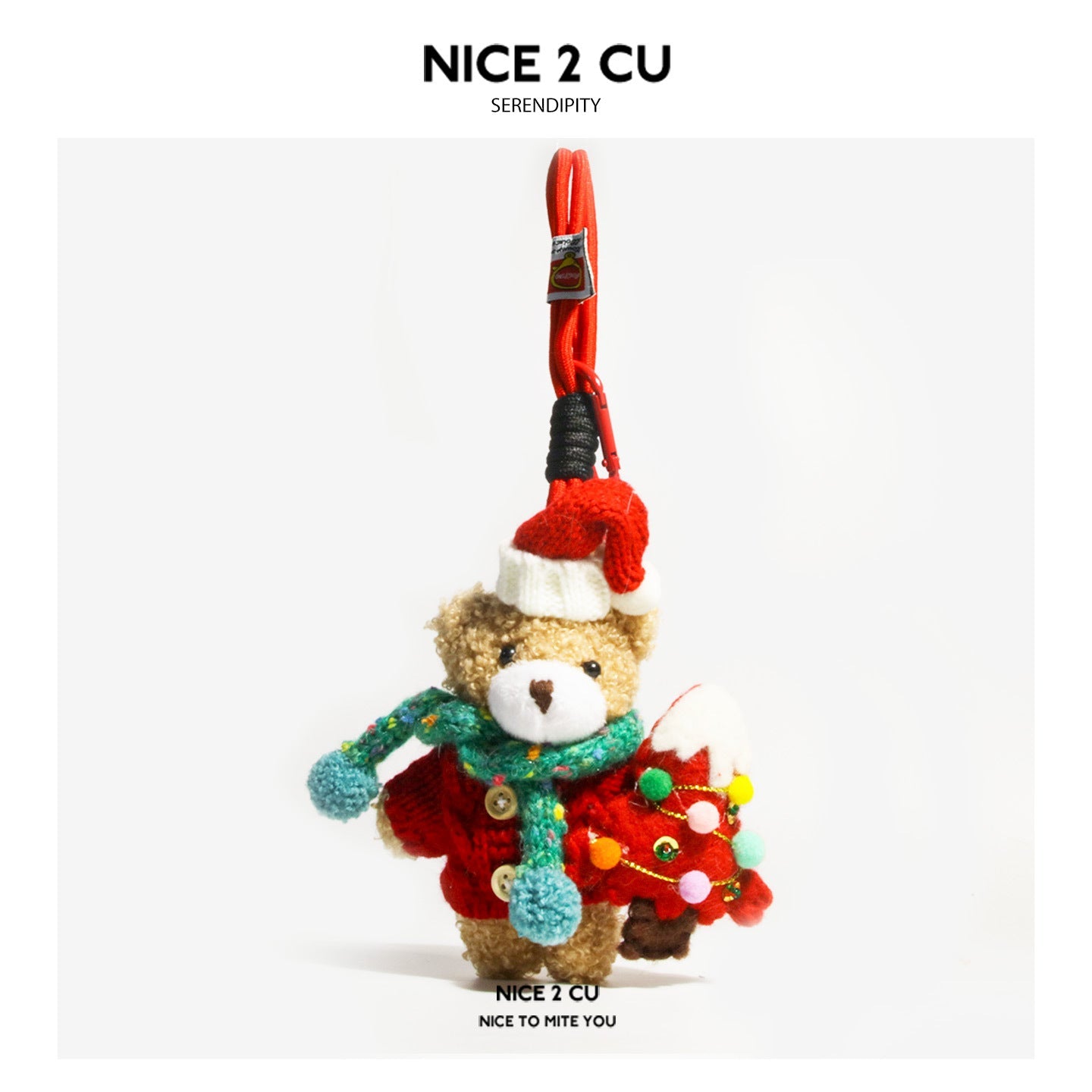 Christmas Tree Boy plush teddy bear charm wearing red knitted coat, teal pom-pom scarf, Santa hat, holding a tiny decorated C
