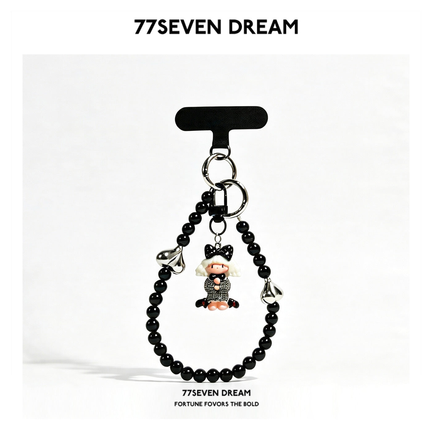 77SEVEN DREAM black bead loop charm strap with white-haired girl figurine in checkered outfit, polka-dot bow, and red shoes