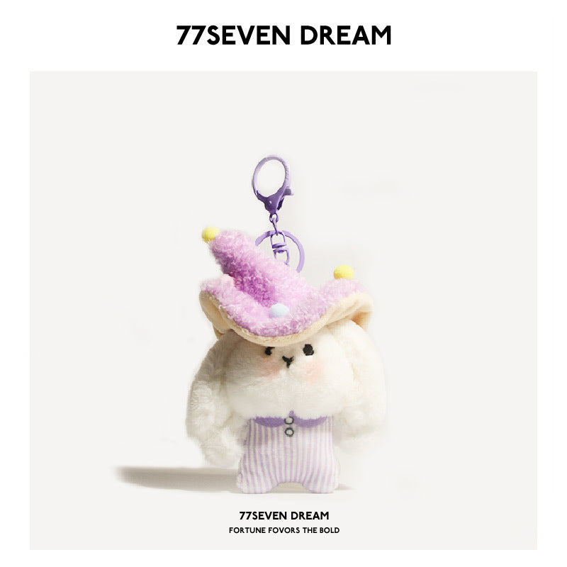 White rabbit plush keychain charm wearing a purple mushroom hat with pom-pom dots and purple striped outfit, metal keyring ha