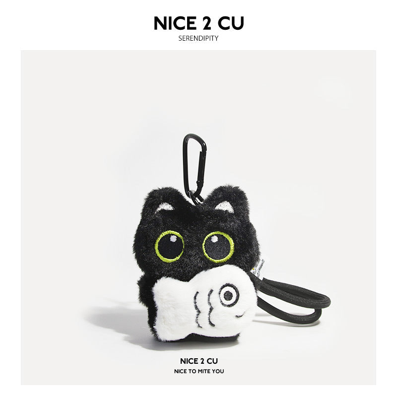 Big-eyed black cat plush keychain holding a white fish skeleton, with black carabiner clip