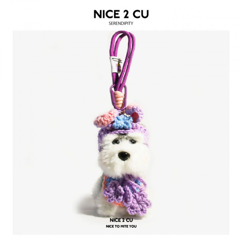 Schnauzer plush charm with purple loop cord, pink and purple rounded ear crochet hat, and purple crocheted collar