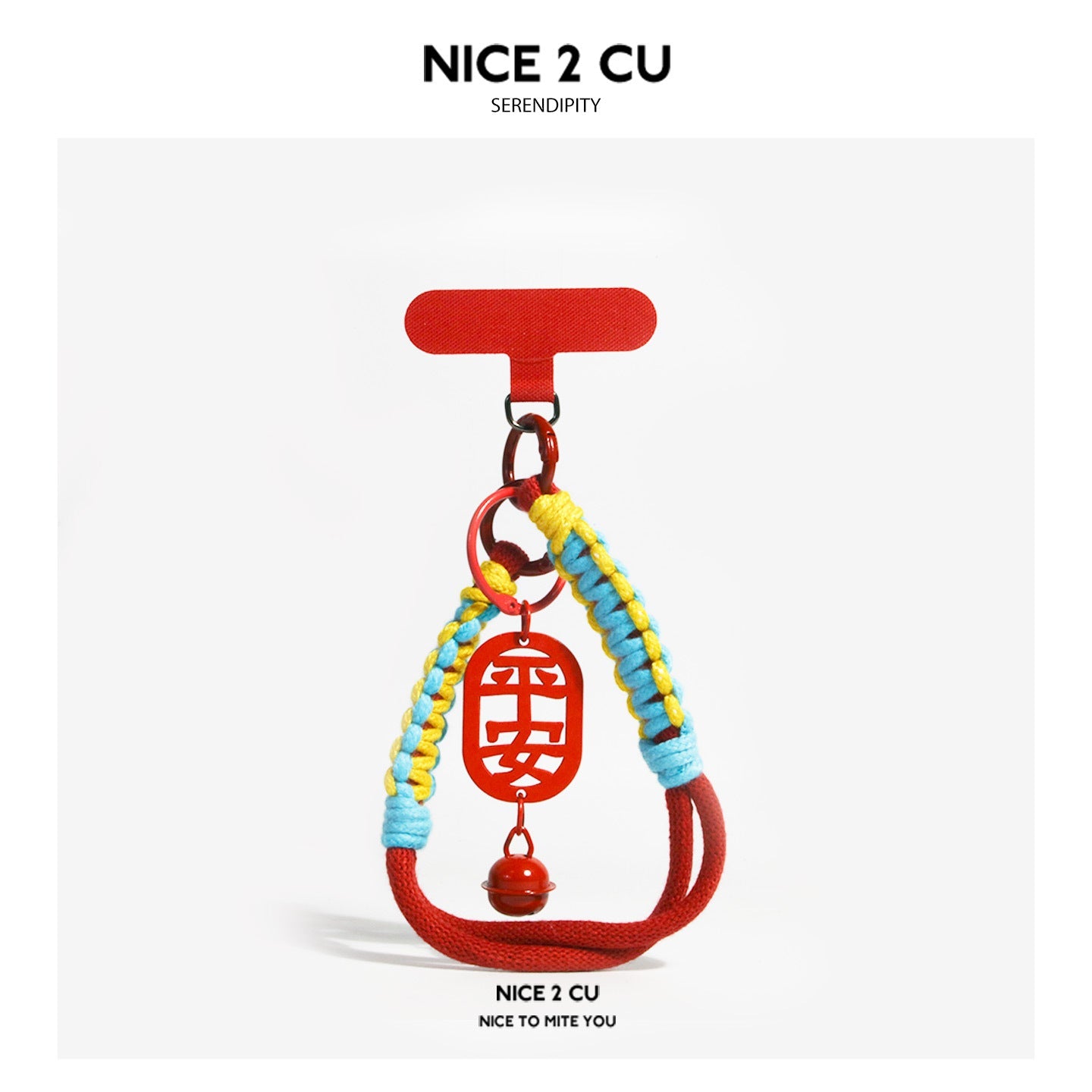 Red festive keychain charm with braided cord and oval red plaque reading 平安 (peace and safety)