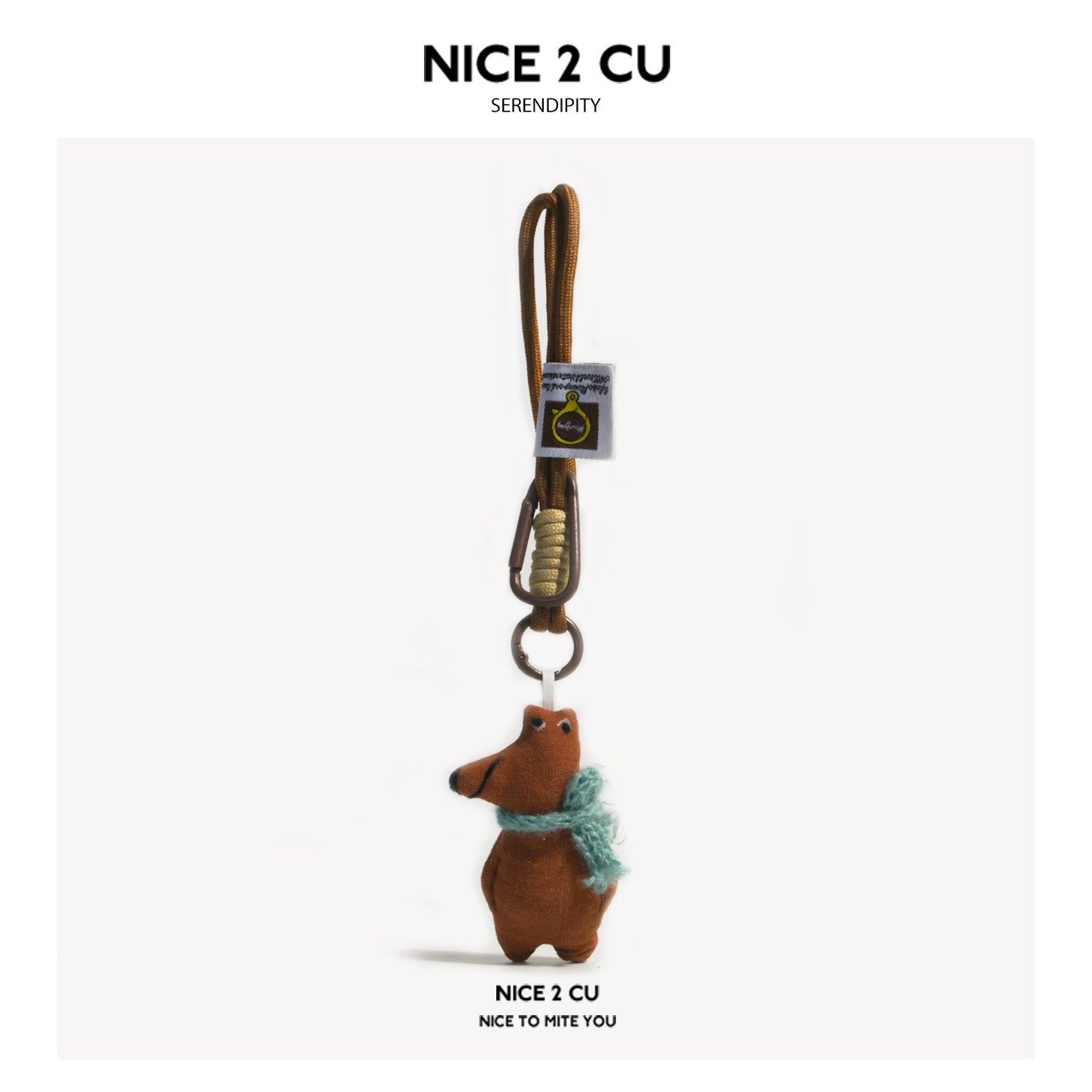 NICE 2 CU brown fox bag charm pendant wearing a teal scarf with brown cord attachment
