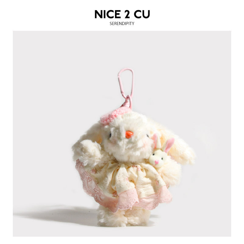 White bunny plush keychain in cream and pink lace outfit with small knit hat and tiny bunny companion