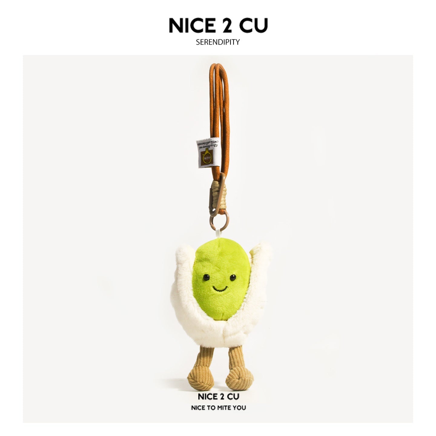 Kawaii pistachio plush charm with raised arms, fluffy cream shell, and metal carabiner clip