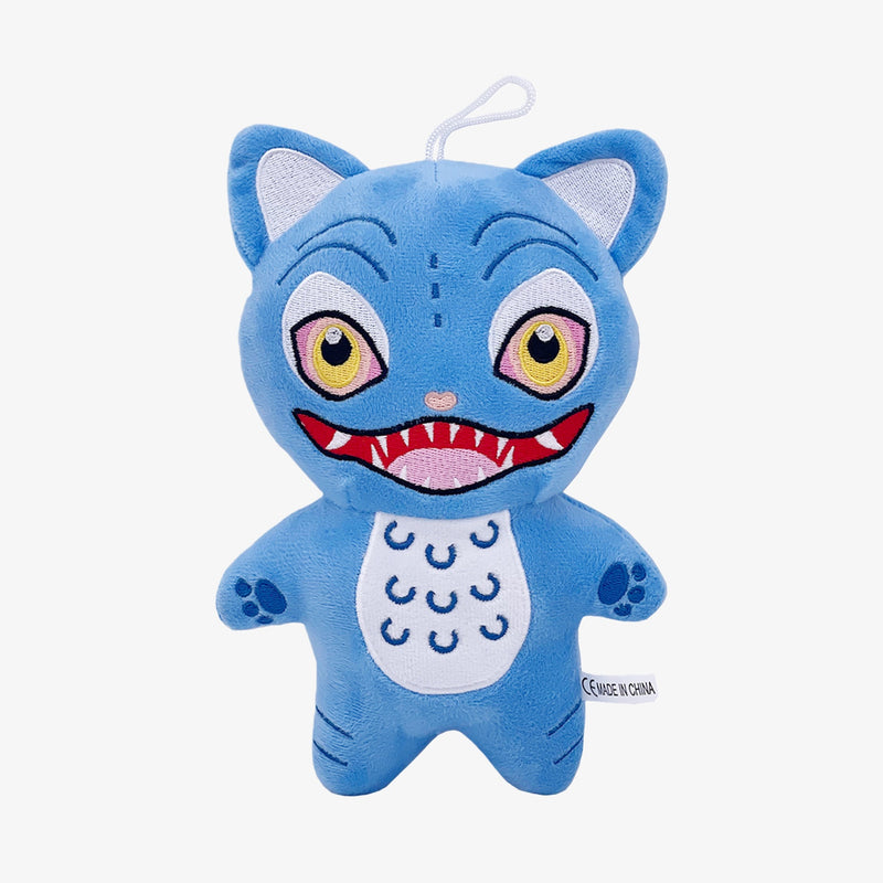 The Demon Hunters Inspired Monster Plush Toy features an anime-style blue creature with a hat, pointed ears, yellow eyes, sharp teeth, and a white belly. This soft collectible doll can hang by a white loop and be posed lying or standing.