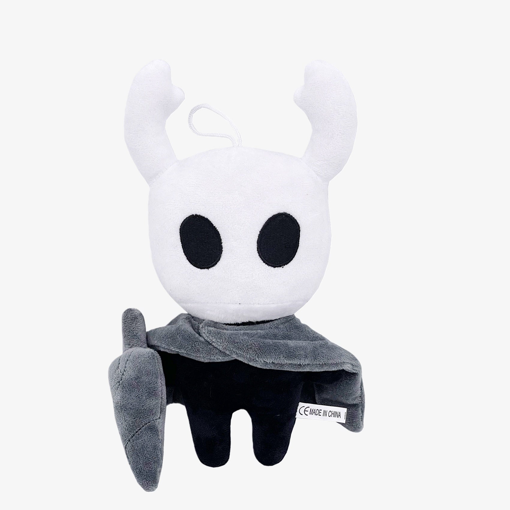 The Officially Licensed Hollow Knight Plush Doll by Hollow Knight features the classic white horned bug character with a gray cloak—perfect as a 10.24-inch soft collectible stuffed toy for fans.