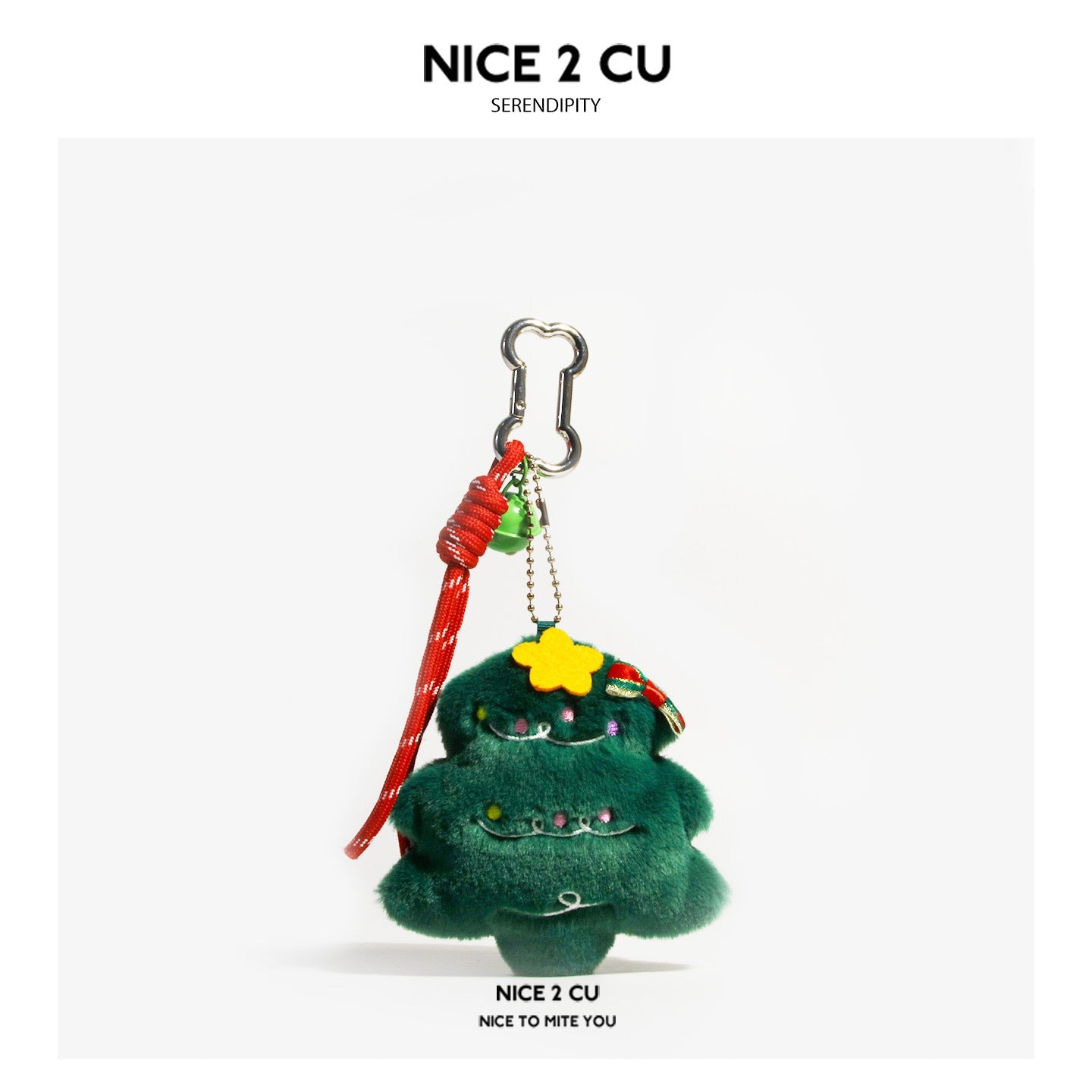 Dark green layered plush Christmas tree charm with multicolored ornaments, yellow star, and metal clip