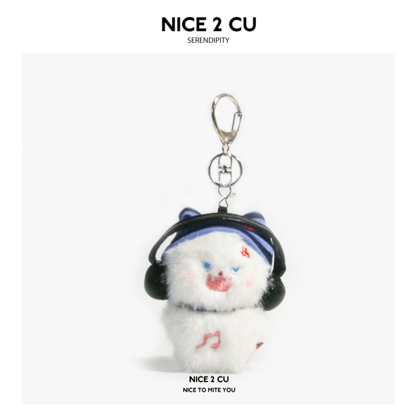White fluffy plush cat keychain charm wearing over-ear headphones and a blue striped hat with a musical note, silver keyring