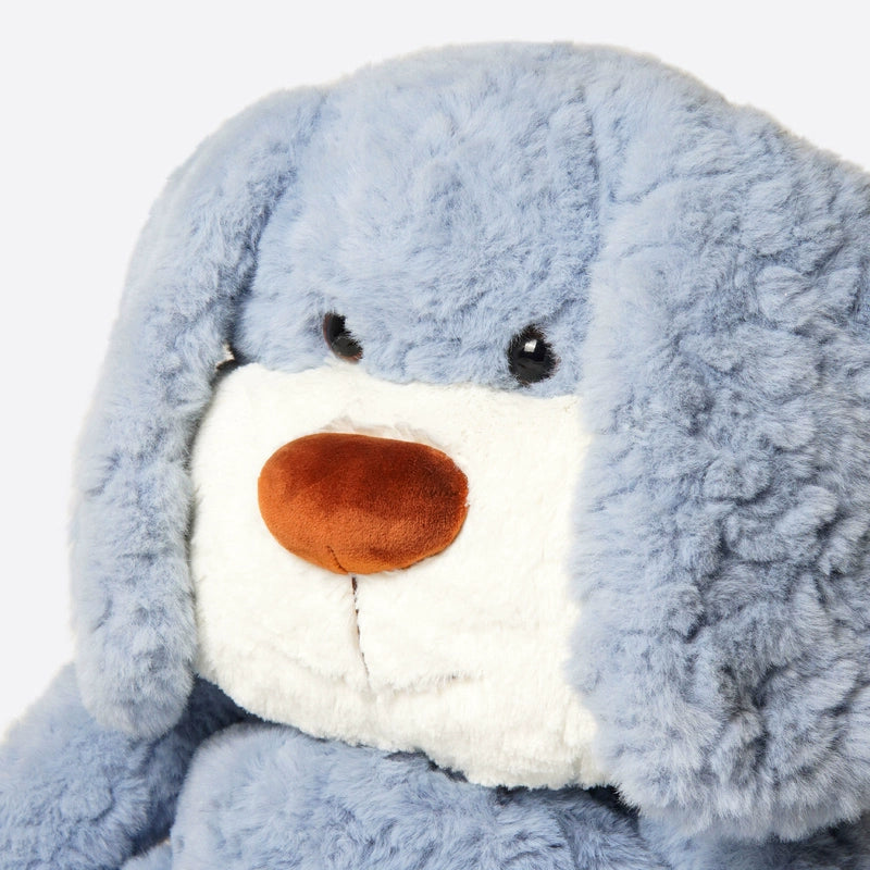 Close-up of the ZEIO Charlie Dog Plush Toy 50cm—a soft, large blue stuffed pup with floppy ears, white snout, black eyes, and brown nose—ideal as a cuddly companion or nursery decor.