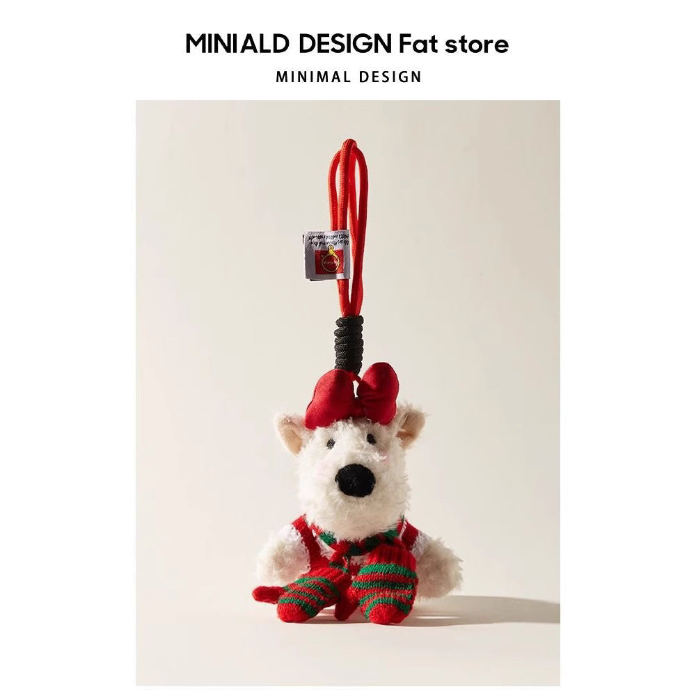 White terrier plush keychain charm wearing a red bow, red and green striped scarf, and matching mittens with a red cord loop