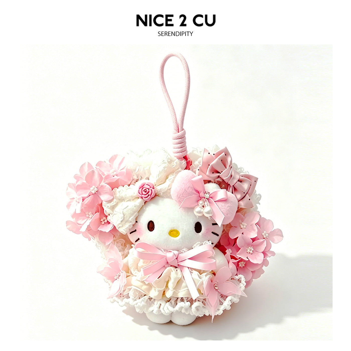 Hello Kitty plush decorative ornament with pink floral wreath, bows, lace accents, and a hanging loop