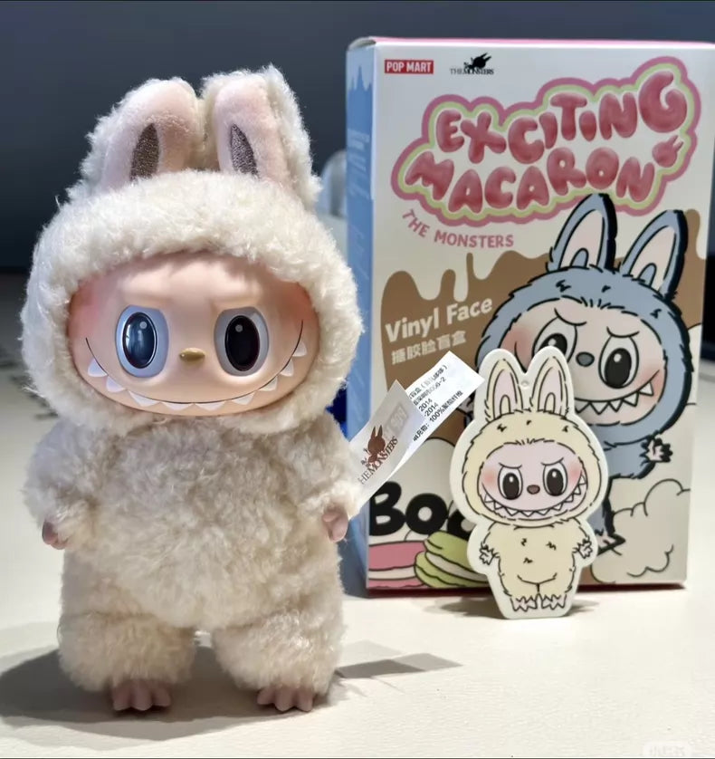 The POP MART Labubu "Soymilk" Plush Keychain is a cute beige bunny doll from The Monsters, perfect for fans of collectible bunnies or Pop Mart Labubu figures.