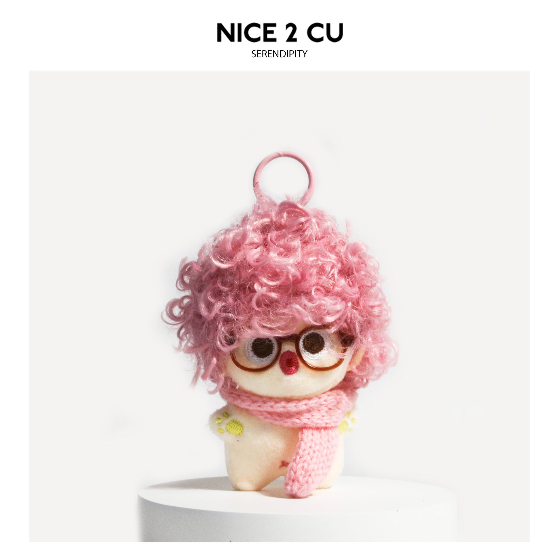Pink curly-hair plush doll bag charm with round glasses and pink knitted scarf, pink hanging ring
