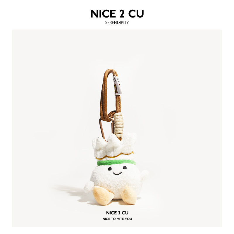 Kawaii shuttlecock plush figure with brown hanging cord, green band, and beige feet
