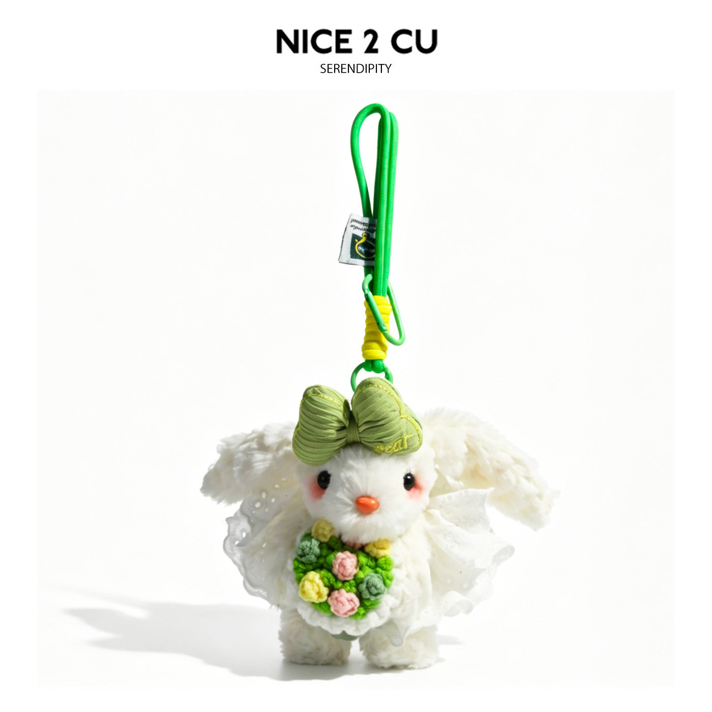 White bunny plush bag charm with green bow, green loop cord, and multicolor pastel bouquet