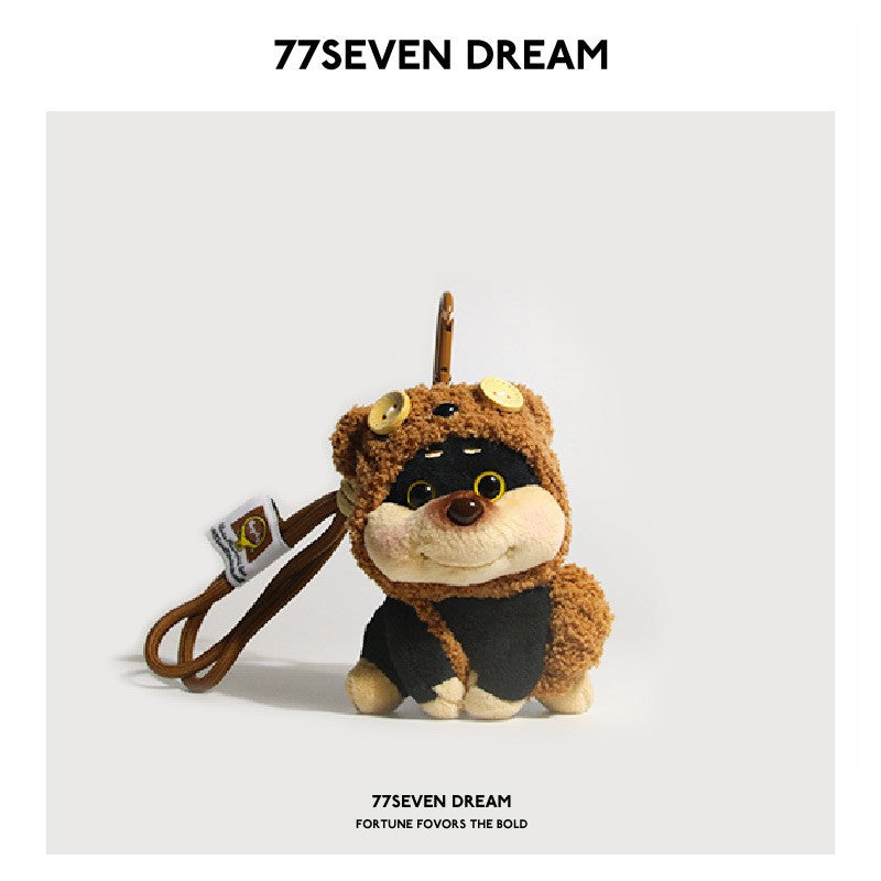 Chubby dog plush charm wearing a brown bear hood with yellow button accents and a metal carabiner clip