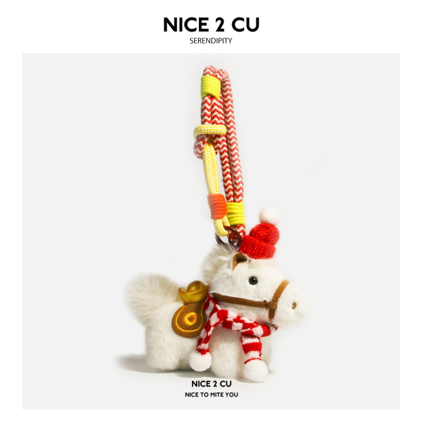 White plush horse ornament with red-and-white striped scarf, red hat, and hanging cord attachment