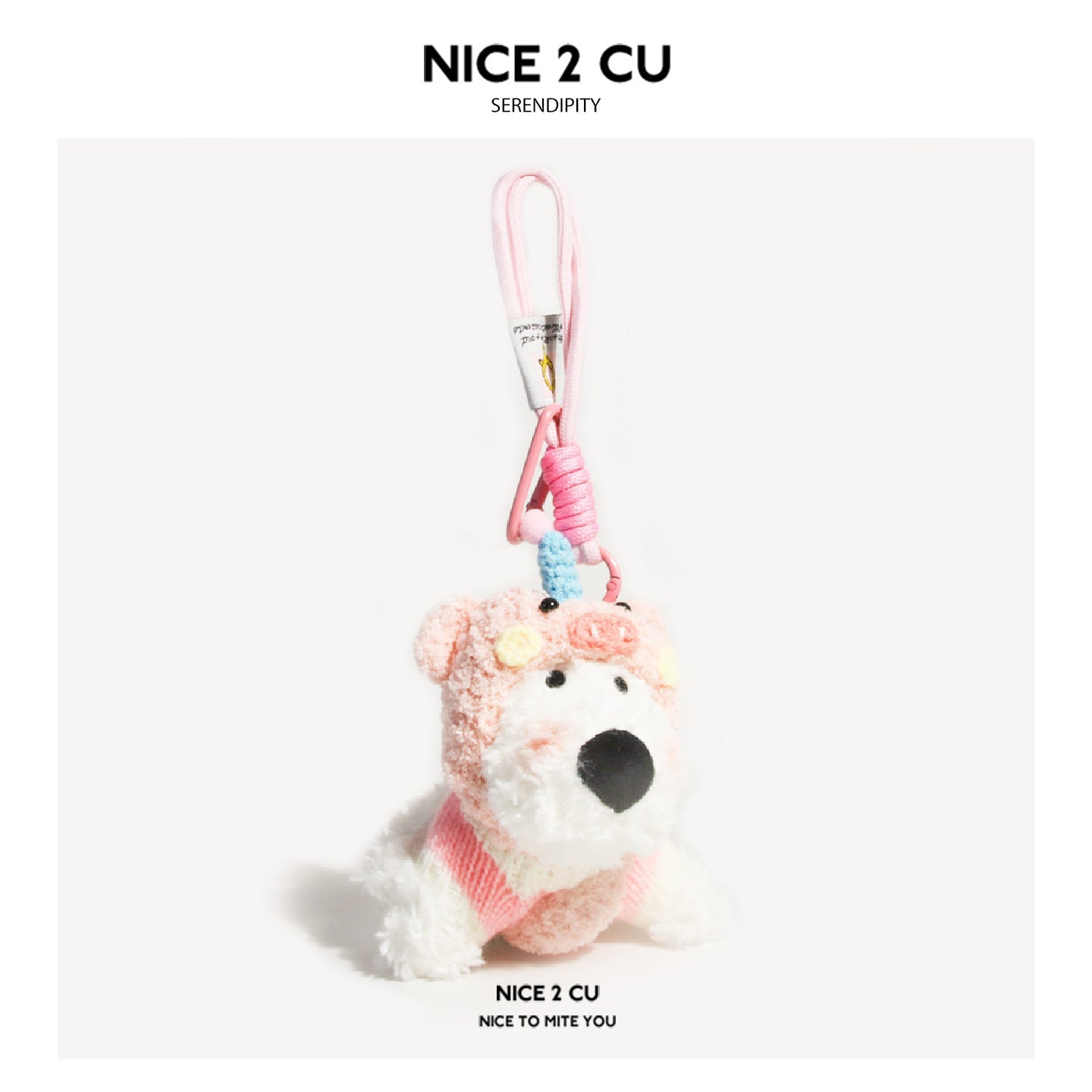 Kawaii dog plush bag charm with pink pig hood and pink knit body on carabiner clip
