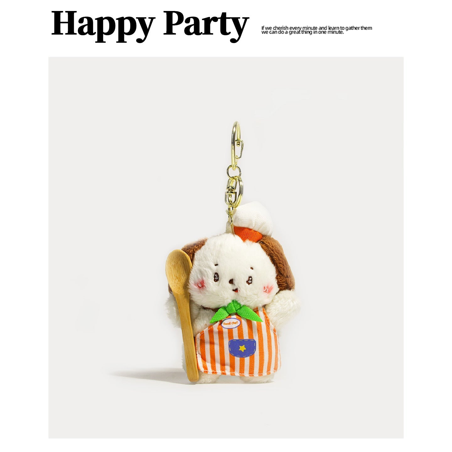 Plush dog keychain charm in an orange and white striped chef apron, green bow, white chef hat, and wooden spoon with gold cla