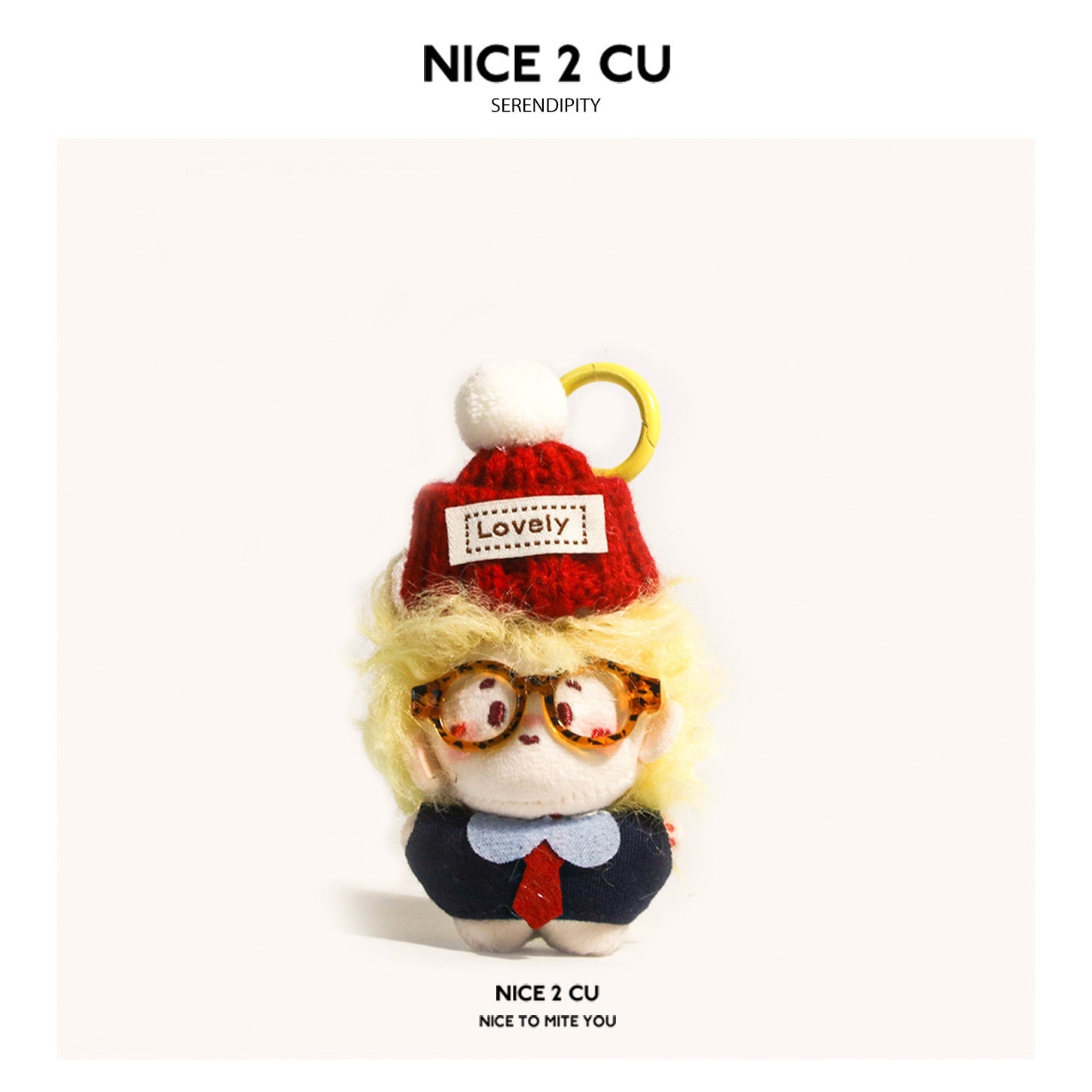 Kawaii chibi plush keychain with blonde hair and red knit pom-pom beanie hat