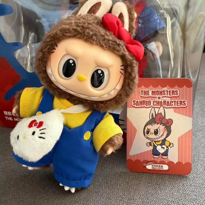 The POP MART LABUBU Hello Kitty and Friends Series Secret Edition Plush Pendant Figure features a plush doll in a brown bunny hood, blue overalls, yellow shirt, and LABUBU Hello Kitty bag—ideal for collectors.